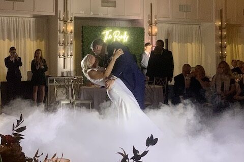 Bride and groom first dance on a cloud